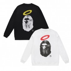 APE Fashion-Forward Hoodie Featuring a primate-head halo print Distressed design for relaxed comfort Trendy couple's style