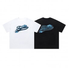 TRAPSTAR Summer Men's T-Shirt Icy Blue Foil-Printed Short-Sleeved Top Black Base with Trendy Glossy Finish Streetwear-Inspired Relaxed Fit T-Shirt