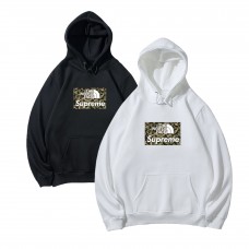 Supreme Casual fashion hoodie with kangaroo pockets, North Face collaboration print, relaxed and comfortable fit.